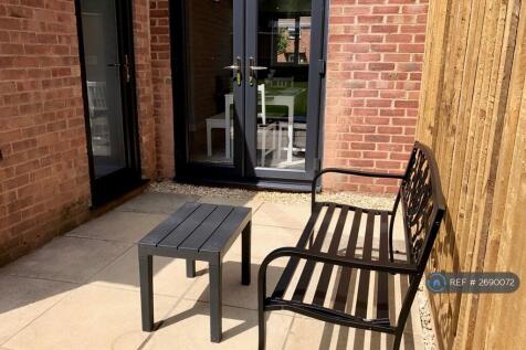 Sunny Patio Area With External Lights