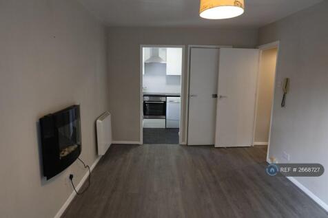 Living Area Opens To Kitchen