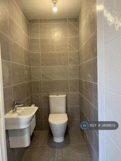 Toilet g/f With Full Height Tiles
