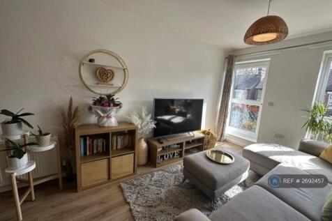 Open Plan Living Room With Balcony Access 