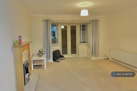 Living Room With French Doors Onto Private Garden 