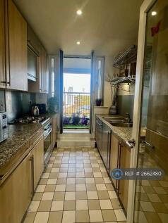 Kitchen With Attached Back Balcony