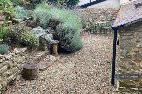 Gravel Patio Area To Rear