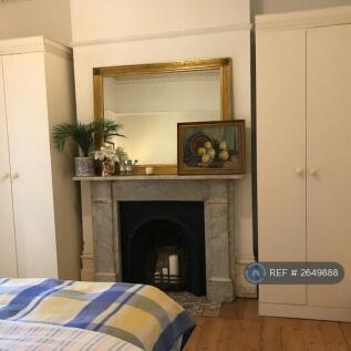 Bedroom With Floor To Ceiling Fitted Wardrobes