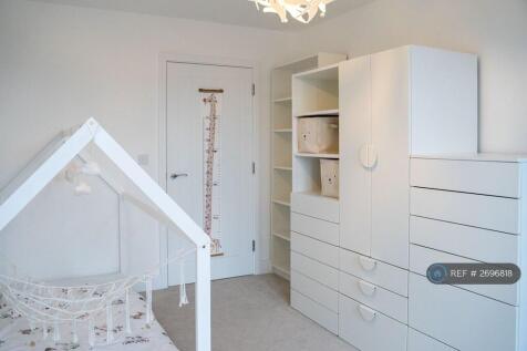 Bedroom With 3 Wardrobes And Bookcase