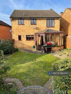 Rear View And Conservatory 