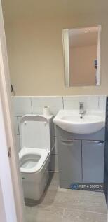Sink &amp; Toilet In Bathroom In Flat