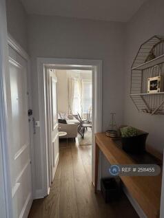 Hallway With Coat Cupboard