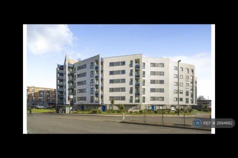 Bus Stops Outside Of Building