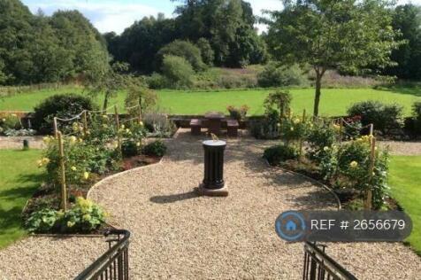 Formal Gardens And Sundial