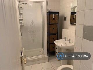 Fully Tiled Shower Room