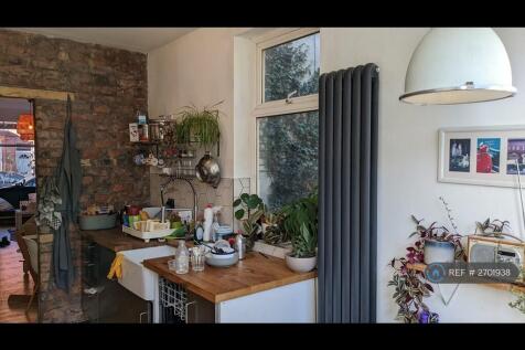 Kitchen: Exposed Brick Wall And Belfast Sink