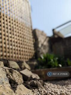 Yarden: Rock Bed And Trellis