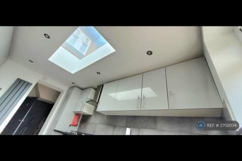 Contemporary Kitchen With a Massive Skylight