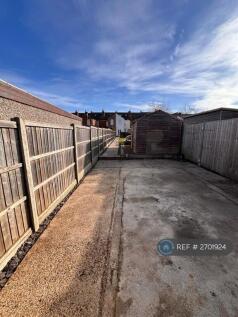 Private Parking With Sheds