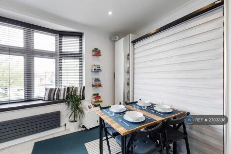 Studio - Dining Area (Bed Up)