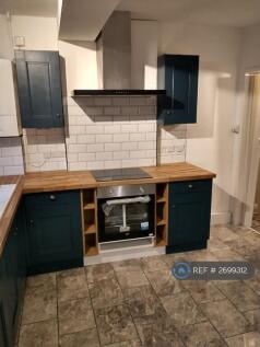 Tiled Floor, Navy Kitchen Units