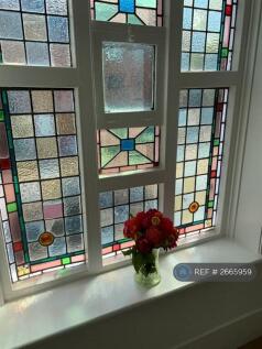 Large Victorian Building With Stained Glass