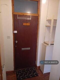 Front Door And Storage Shelves