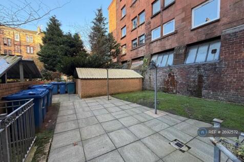 Grass Area Washing Line And Bin Shed