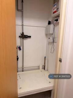 Airing Cupboard With Washing Machine Plumbing