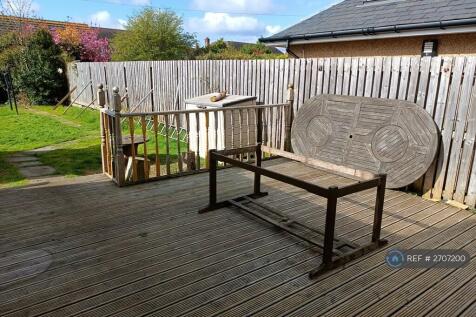 Decking With Large Outdoor Table