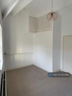 Front Bedroom With Vaulted Ceiling