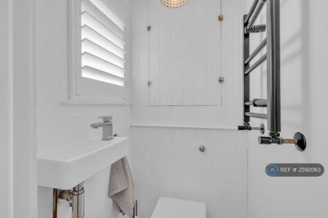 Bathroom With Shower And Toilet, Basin And Mirror
