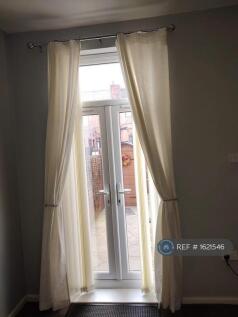 French Windows Into Rear Garden