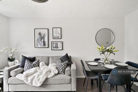 Sofa And Dinning Space In This Luxurious Flat
