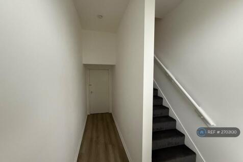 Stairs To The Right With Rear Exit To The Left