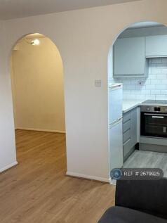 Looking Through To Sleeping Area And Kitchen