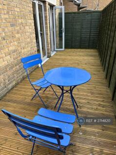 Bistro Table And Chair Set On Terrace 