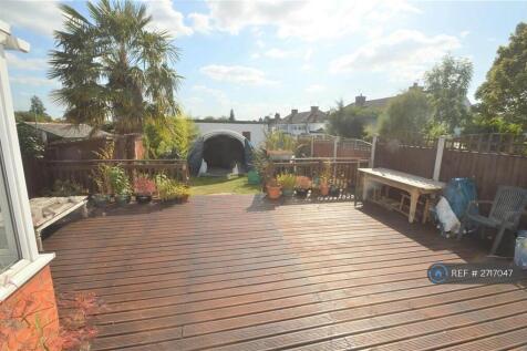 Garden And Garage At The End