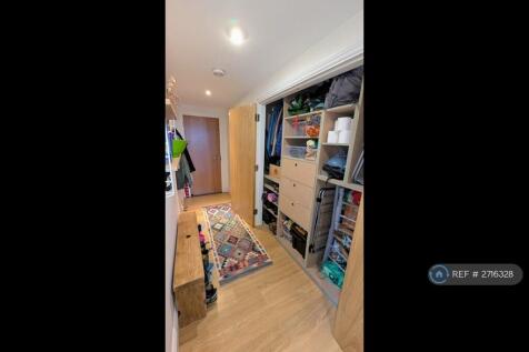 Entrance Hallway With Large Storage Cupboard