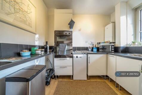 Integrated Kitchen With All White Goods