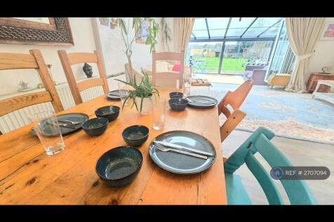 Family Dining Table And Fully Stocked Kitchen 