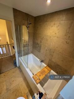 Shower/Bath In Family Bathroom 