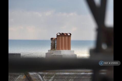 Sea View Over The Roof Tops