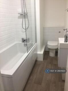 Smart Bathroom With Shower Over Bath