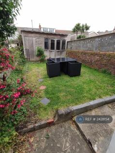 Rear Garden And Summer House