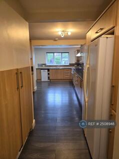 Large Kitchen With a Number Of Cabinets 