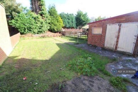 Back Garden With Outhouses