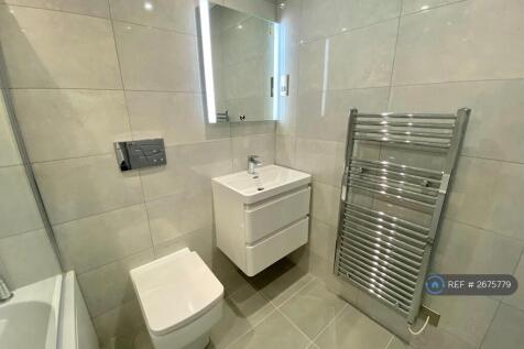 Bathroom With Mirror Light &amp; Heated Towel Rail