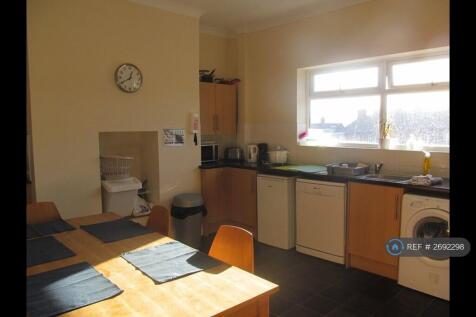 Kitchen With Dishwasher Washer Freezer And Fridges