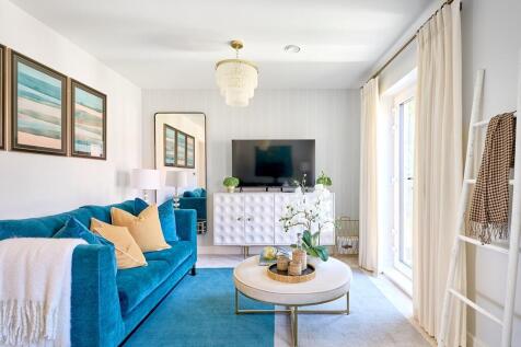 A bright and airy living room is found on the first floor