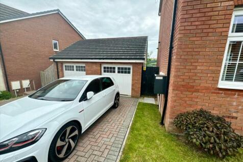 Garage With Driveway