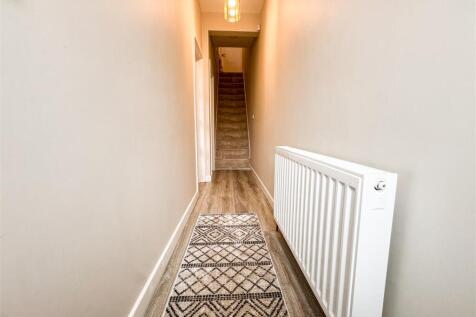STAIRS RISING TO THE FIRST FLOOR