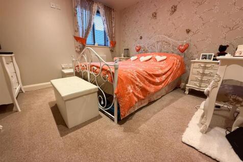 PRIMARY BEDROOM ONE