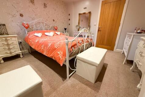 PRIMARY BEDROOM ONE